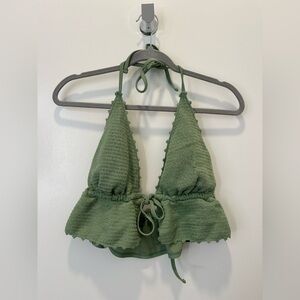 Green swimsuit top